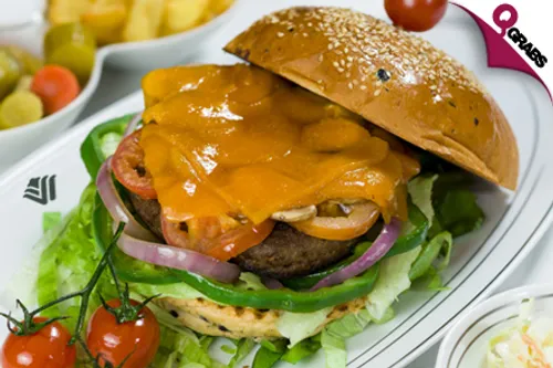 For QR62 Feast on one of the Biggest Burgers in Town at the Wyndham Grand Regency Doha! (QR125 Value)